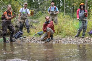 Volunteers and Volunteer Staff pause for a distanced group photo while conducting Wood Turtle Research